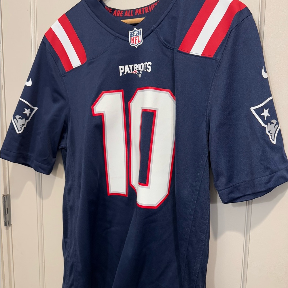 Navy Blue Jersey with Number 10 (Jones) and Team Logo